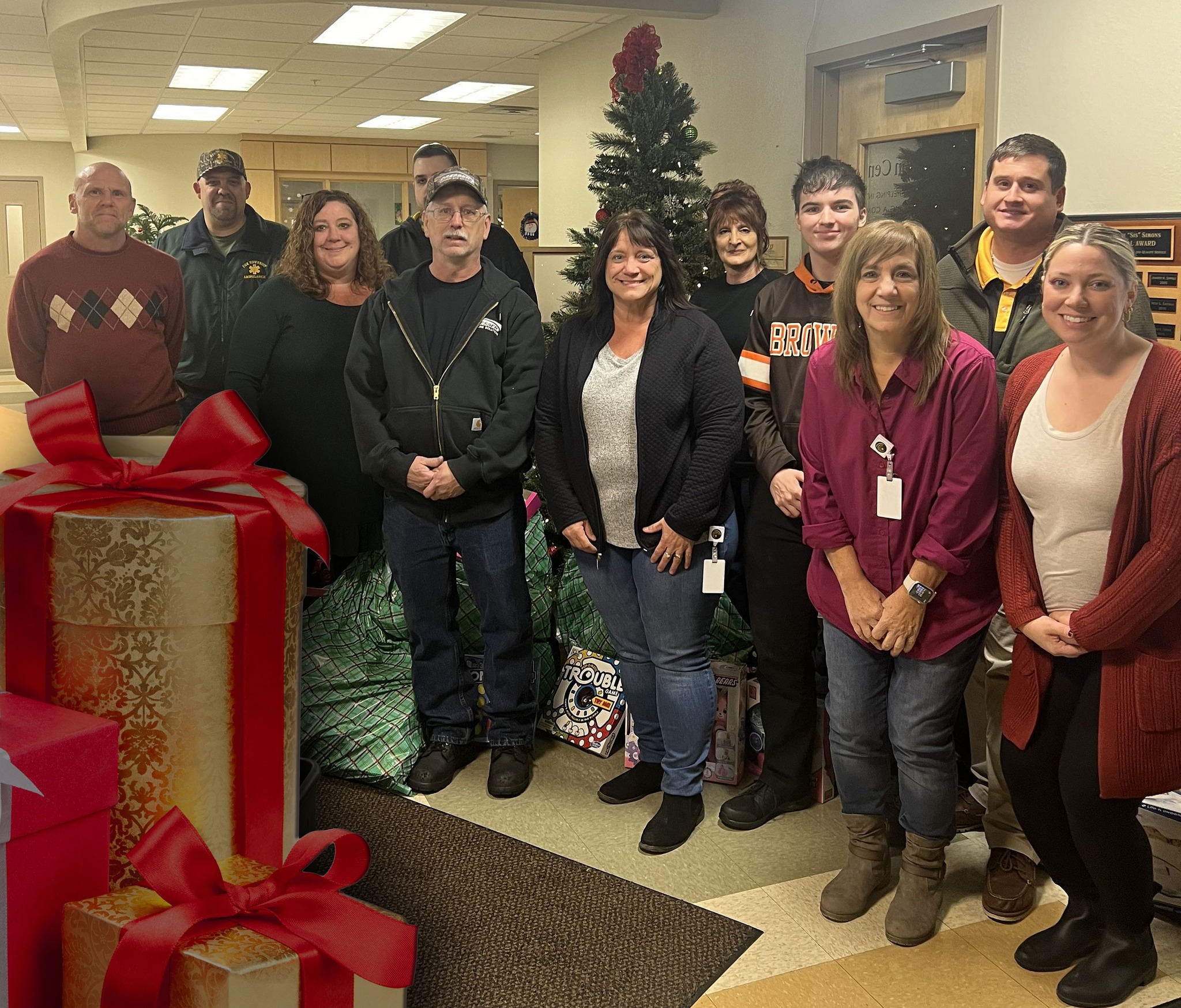 Morgan and DCI employees pictured with donated gifts